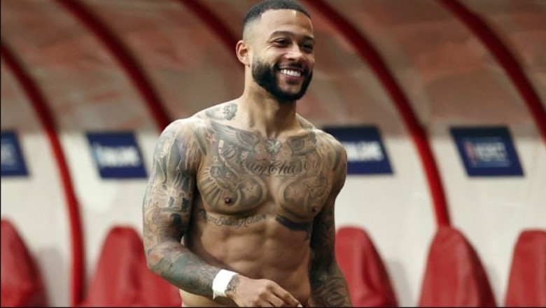 Depay is known for his large lion back tattoo and bold style on the pitch